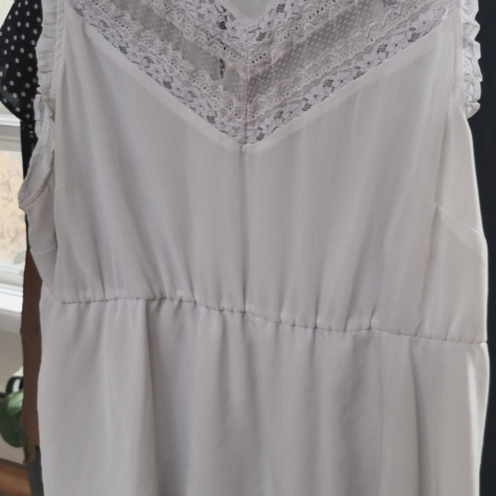 White formal top with lace accents